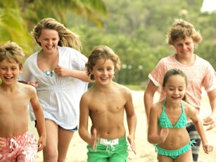 Kids playing on the beach - Hamilton Island holidays with kids