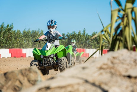 Kids enjoy the quad bike racing track - family holiday Hamilton Island