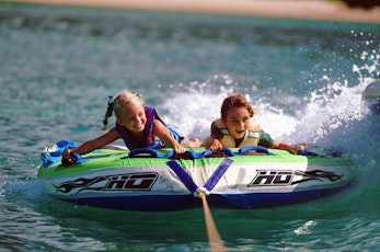 Family fun on the water hiring a tube - family packages Hamilton Island 
