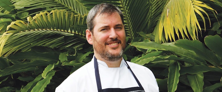 Adam Woodfield, chef at Whitsunday Island resort restaurant, coca chu – a popular choice among people enjoying Queensland family holiday packages.
