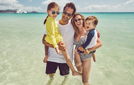 Jason Ierace Family at Whitehaven beach on Hamilton Island Holiday
