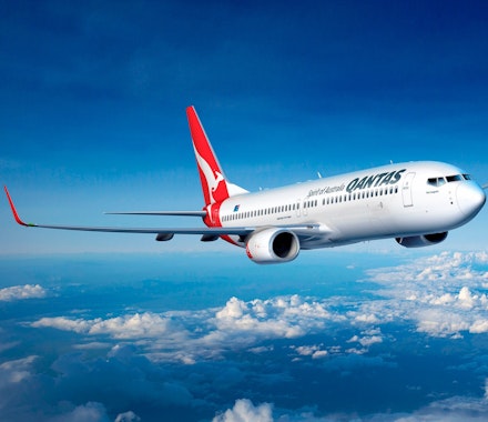 Qantas B737-800. Many people prefer Australia's largest airline company when heading for a family beach vacation on Hamilton Island's luxury resorts