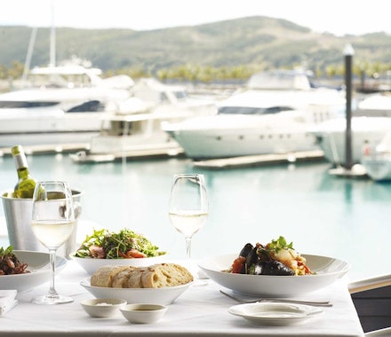 Hamilton Island honeymoon - enjoy a meal on the water at Romano's 