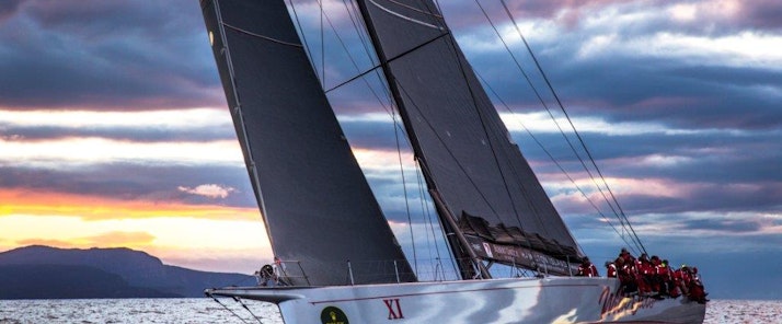 Wild Oats XI sailing at sunset - luxury holiday Hamilton Island 