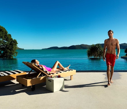 Relax by Pebble Beach Pool at qualia on Hamilton Island - hotel deals Hamilton Island 