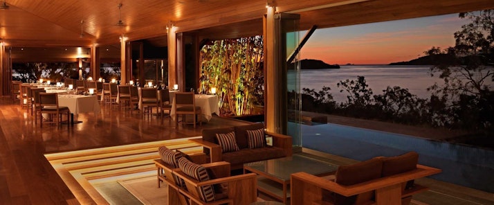 Enjoy a romantic dinner at sunset in Long Pavilion overlooking the Whitsundays - Hamilton Island accommodation 