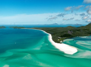 Explore Whitehaven Beach and Hill Inlet from the air - luxury holiday Hamilton Island 