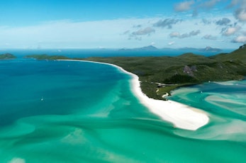 Explore Whitehaven Beach and Hill Inlet from the air - luxury holiday Hamilton Island 